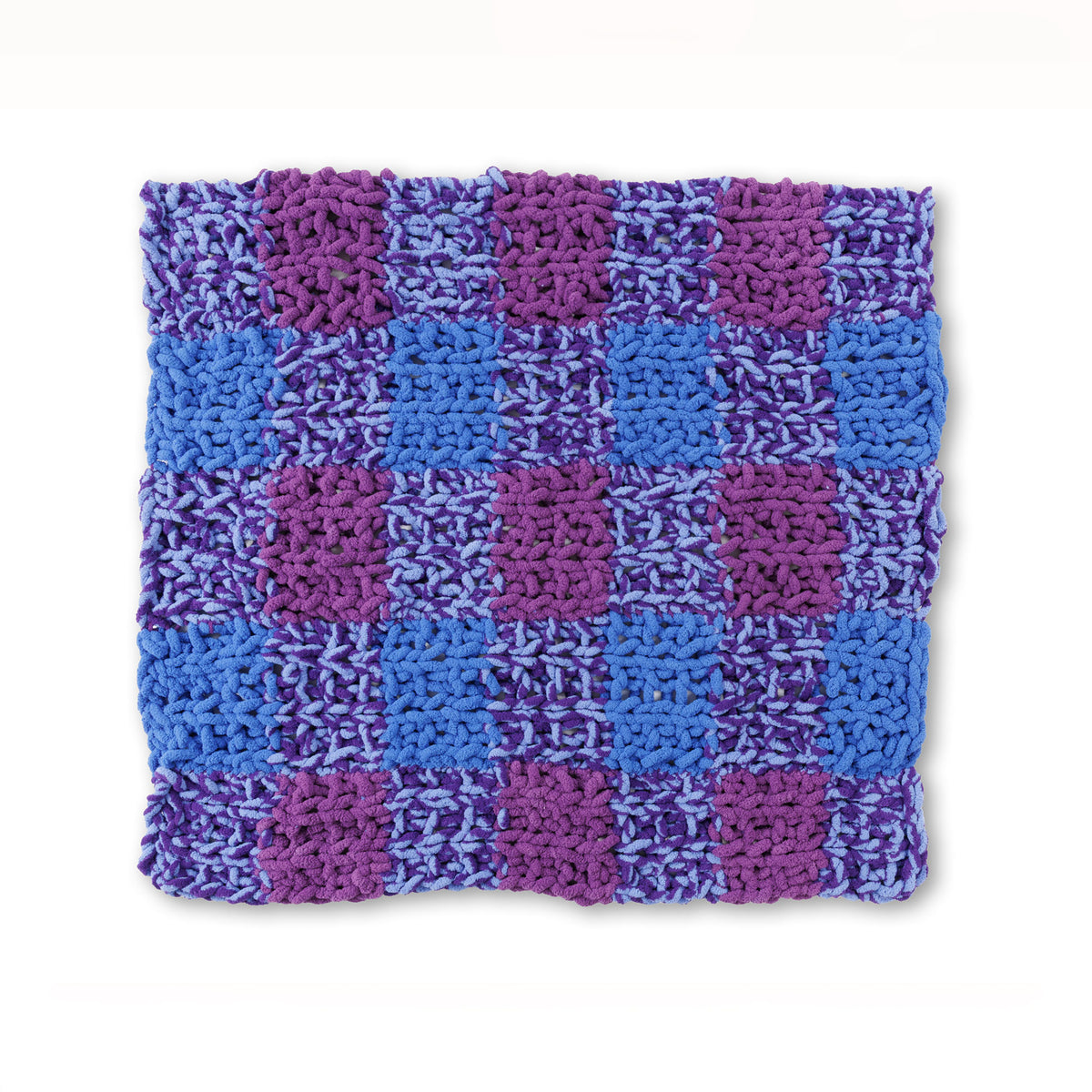 Just Plaid To Be Here Table Knit Blanket made using Bernat yarn on a white background