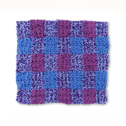 Bernat Just Plaid to Be Here Table Knit Blanket Just Plaid To Be Here Table Knit Blanket made using Bernat yarn on a white background