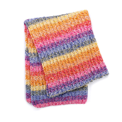 Bernat Eyelet Ridge Knit Blanket Eyelet Ridge Knit Blanket made using Bernat yarn in a styled lifestyle setting