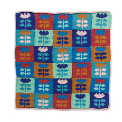 Bernat Meadow Mosaic Knit Blanket Meadow Mosaic Knit Blanket made using Bernat yarn on a white background