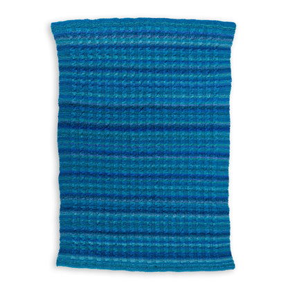 Bernat Knit Classic Cables Throw Knit Classic Cables Throw made using Bernat yarn on a white background