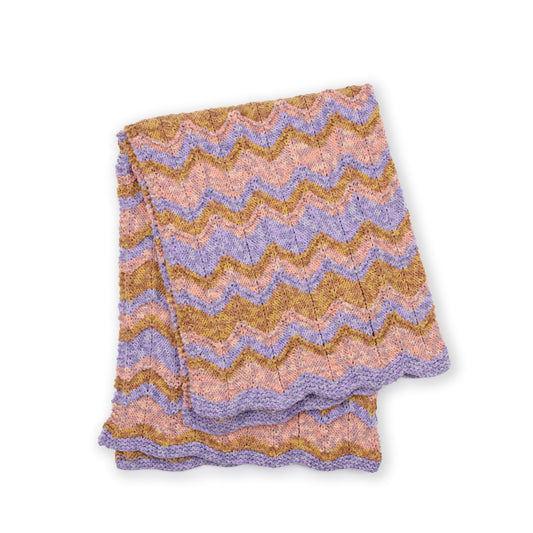 Enchanted Drift Knit Chevron Blanket made using Bernat yarn