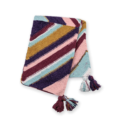 Bernat Quarter Stripes Knit Blanket Quarter Stripes Knit Blanket made using Bernat yarn in a styled lifestyle setting