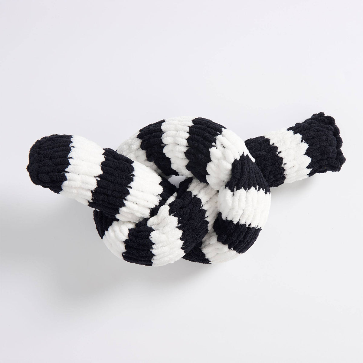 Ez Knit Striped Knot Pillow made using Bernat yarn