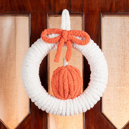 Bernat Wrapped Pumpkin Wreath Wrapped Pumpkin Wreath made using Bernat yarn