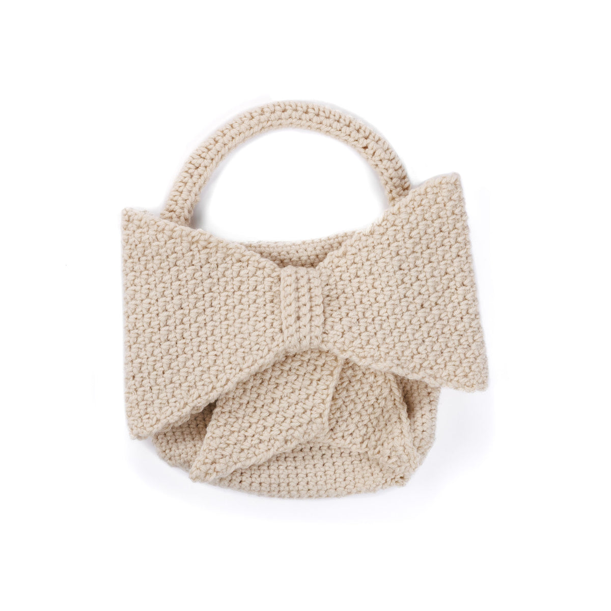 Crochet Bow Bag made using Caron yarn on a white background