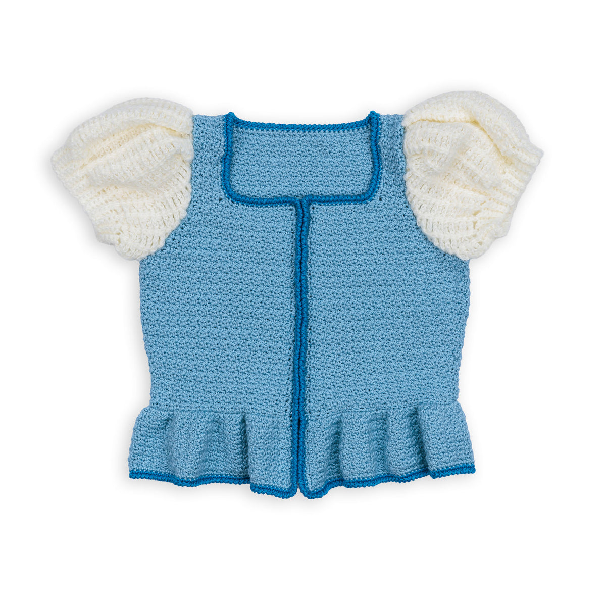 Crochet Luminous Top made using Caron yarn on a white background