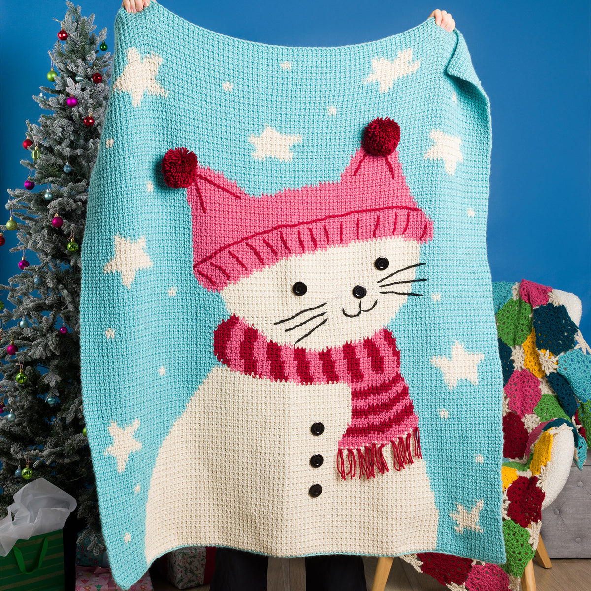 Feline Frosty Intarsia Crochet Blanket made using Caron yarn