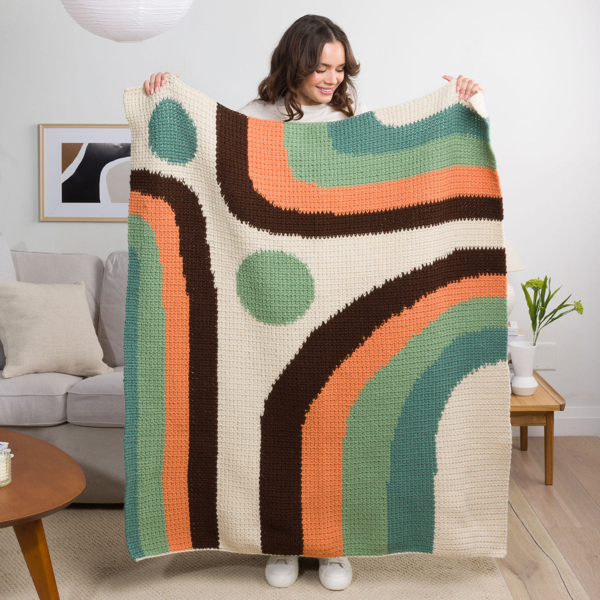 Calm Current Crochet Blanket made using Caron yarn