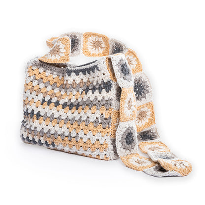 Caron Crochet Tie Top Tote Crochet Tie Top Tote made using Caron yarn in a styled lifestyle setting