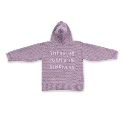 Caron Shimmering Phrase on Crochet Pullover Shimmering Phrase On Crochet Pullover made using Caron yarn in a styled lifestyle setting