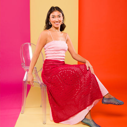 Caron Filet Crochet Pomegranate Apron Filet Crochet Pomegranate Apron made using Caron yarn in a styled lifestyle setting
