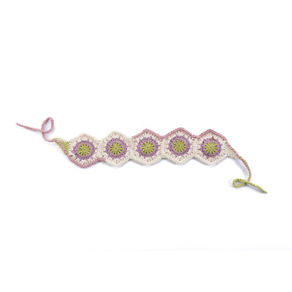 Caron Summer Mode Crochet HeadBand Summer Mode Crochet Headband made using Caron yarn on a white background