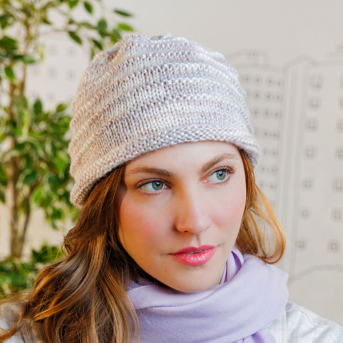 Garter Ridges Minimalist Knit Beanie made using Caron yarn in a styled lifestyle setting