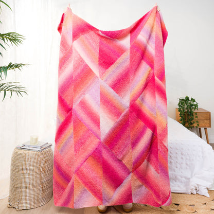 Caron Patchwork Triangles Knit Blanket Patchwork Triangles Knit Blanket made using Caron yarn