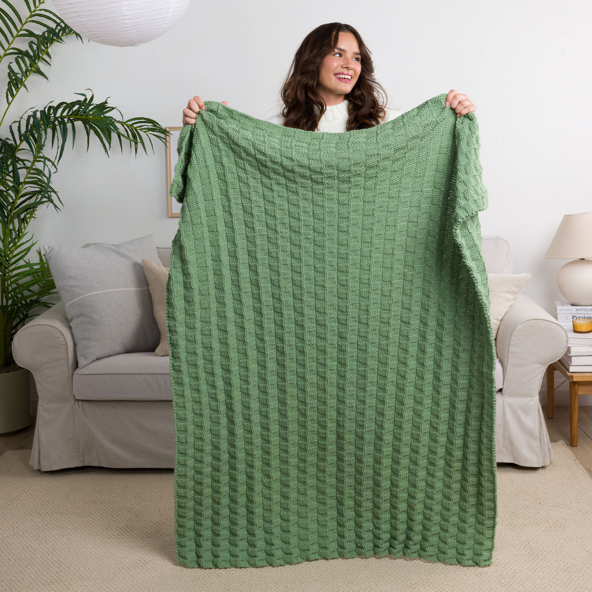 Rich Textures Knit Blanket made using Caron yarn
