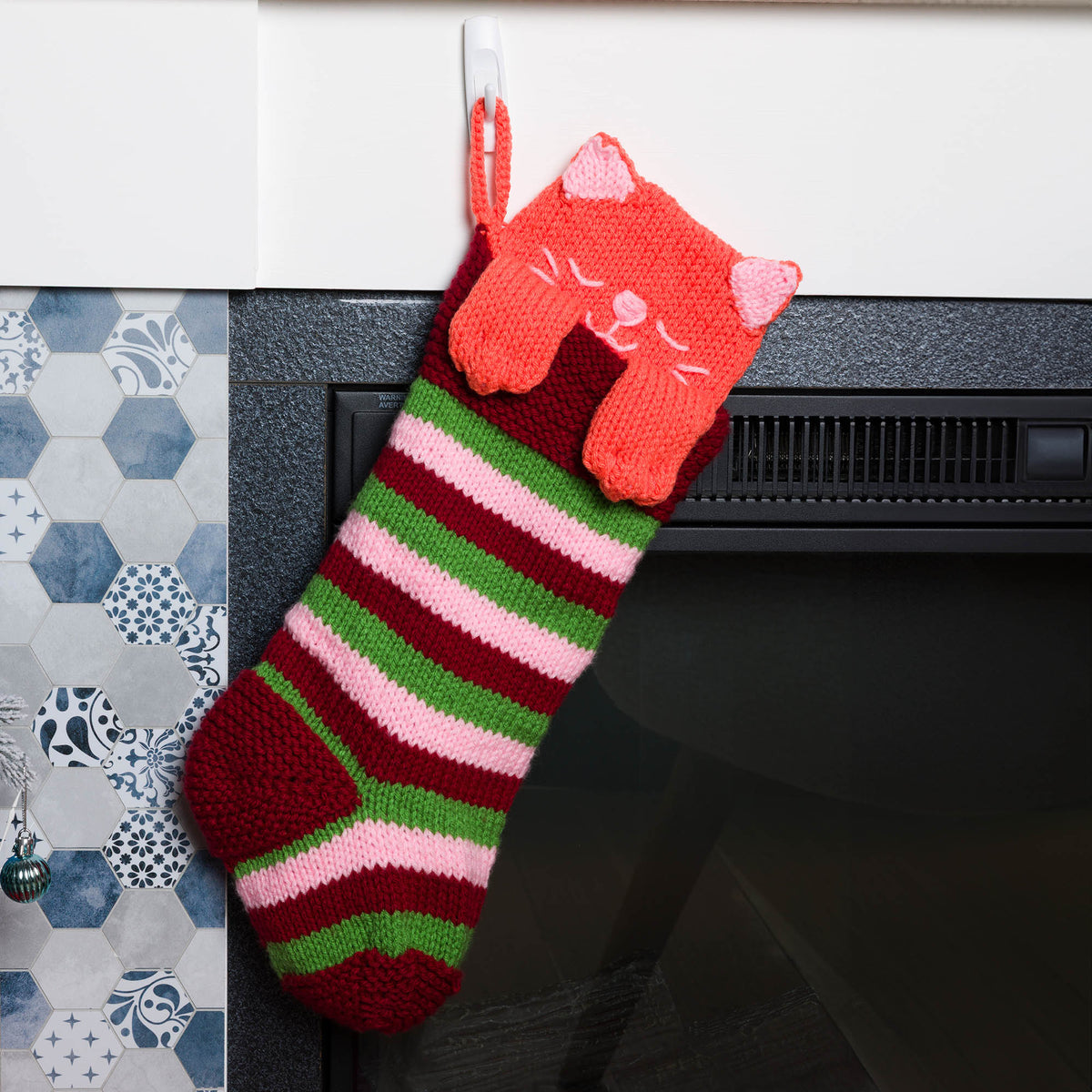 Knit Meowy Christmas Stocking made using Caron yarn