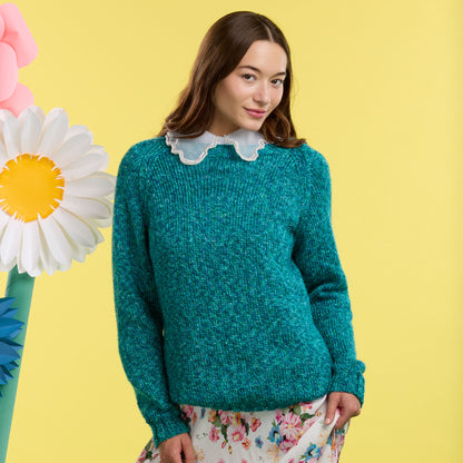 Caron For Keeps Knit Sweater For Keeps Knit Sweater made using Caron yarn in a styled lifestyle setting