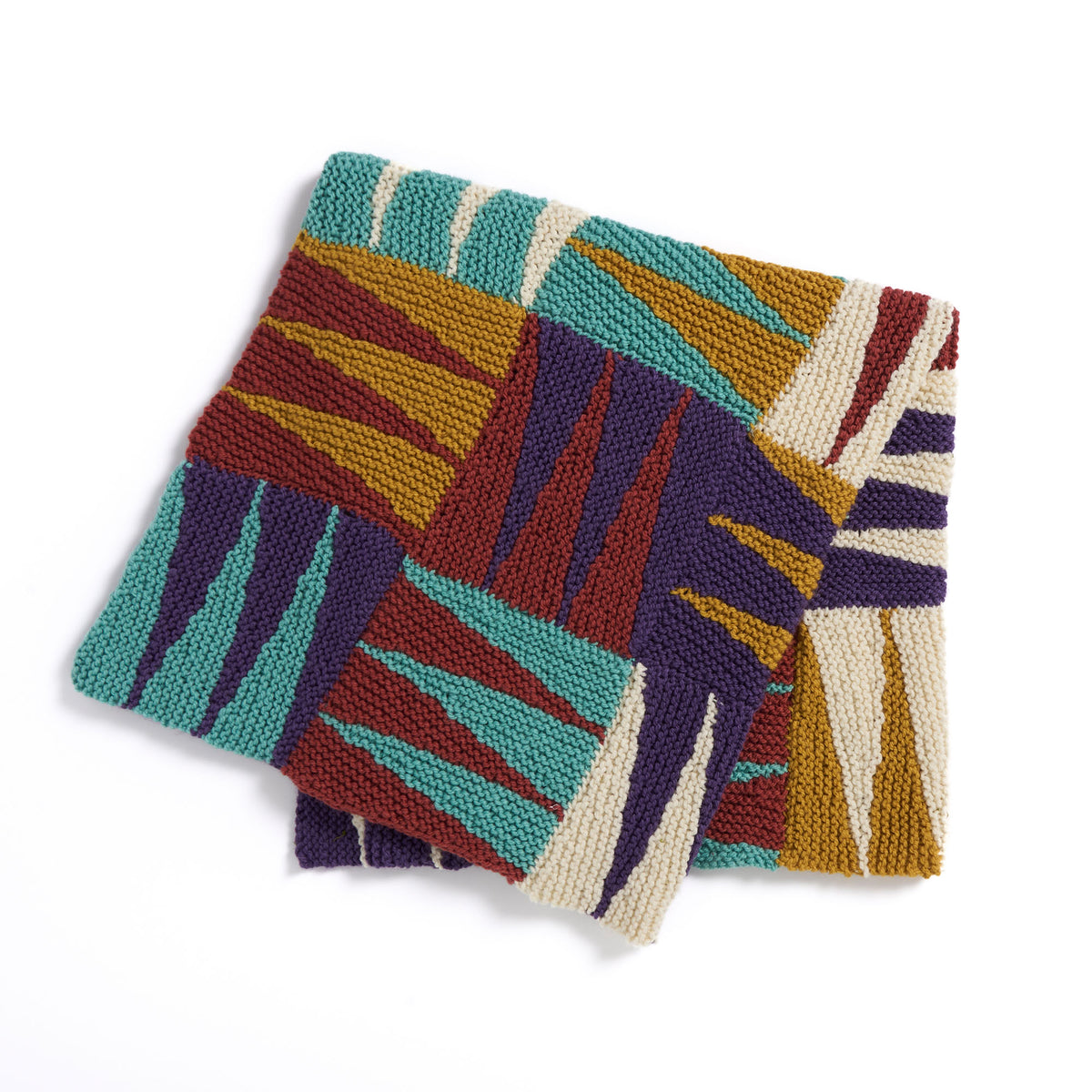 Cozy Claws Knit Blanket made using Patons yarn