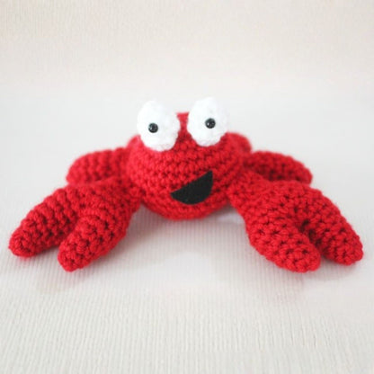 Red Heart Feeling Crabby Crochet Amigurumi Feeling Crabby Crochet Amigurumi made using Red Heart yarn in a styled lifestyle setting