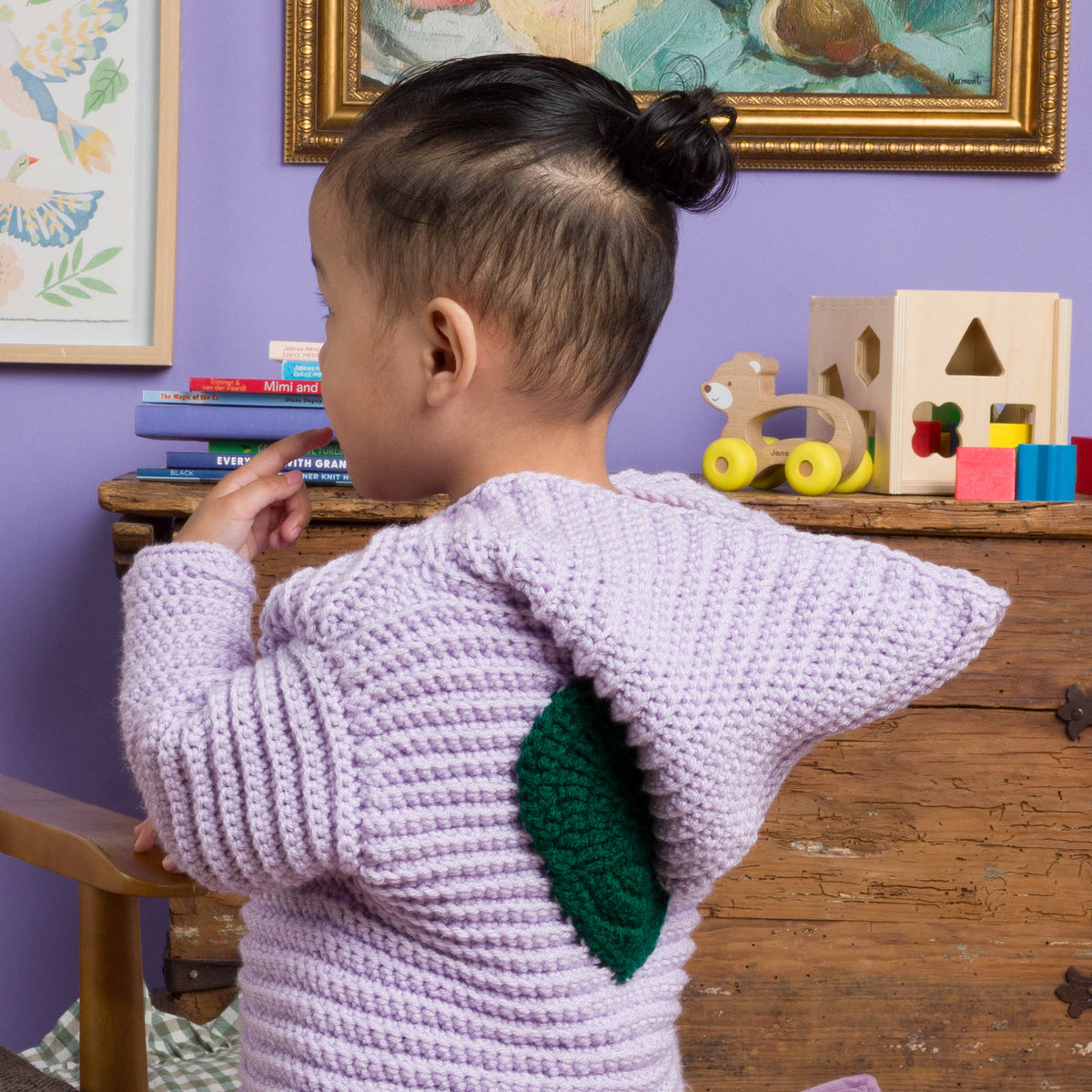 Little Lovebug Crochet Cardigan made using Red Heart yarn