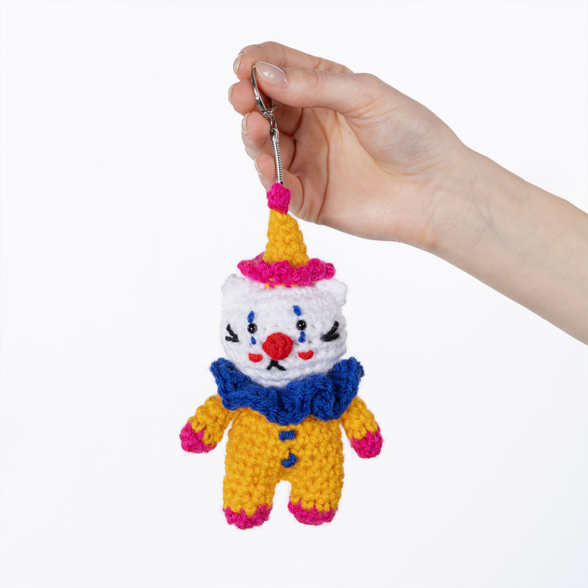 Cobbles The Cat Clown Crochet Charm made using Red Heart yarn