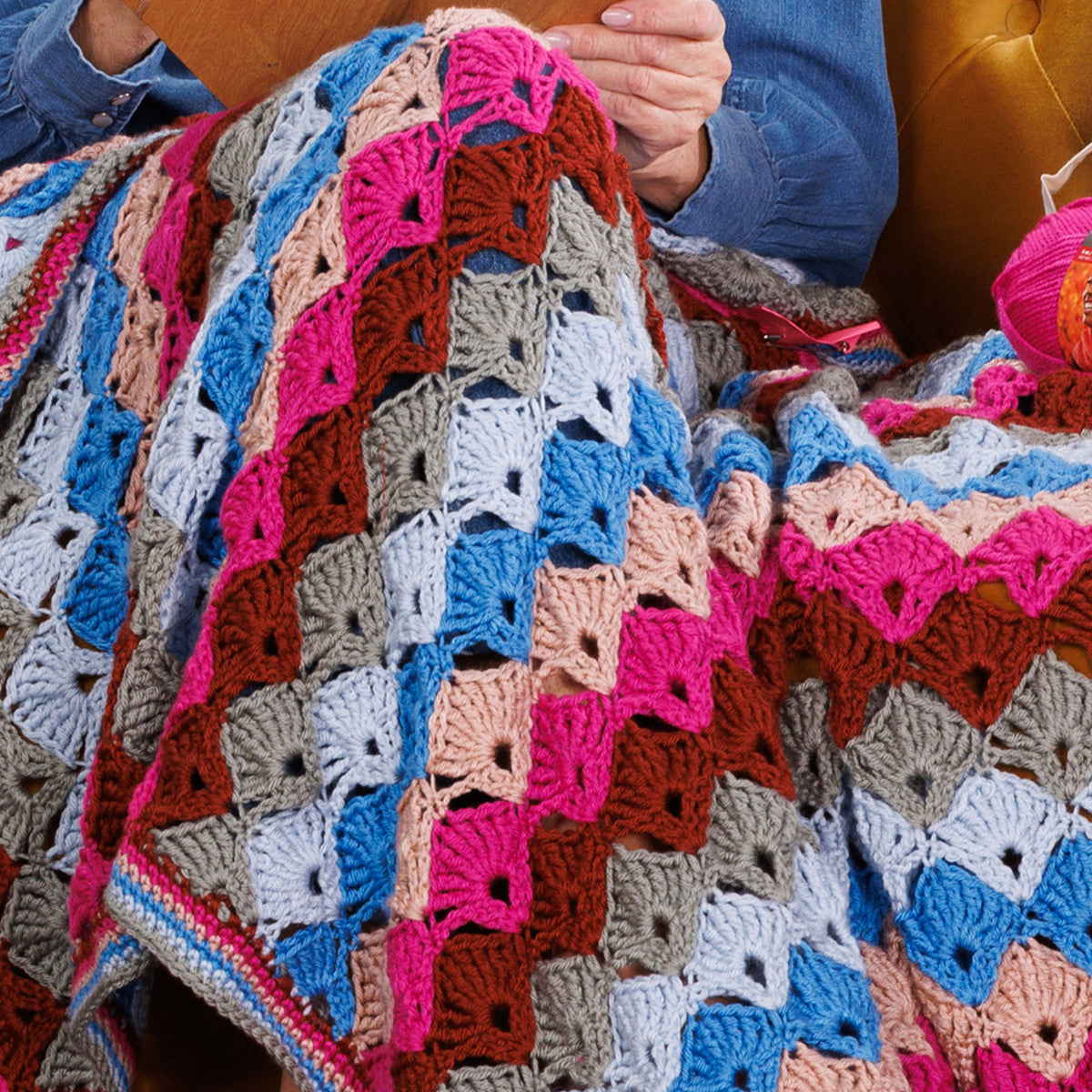 Twilight Sea Shells Throw made using Red Heart yarn