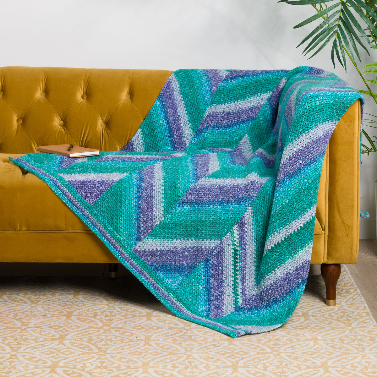 Change Of Stripes Crochet Panel Blanket made using Red Heart yarn