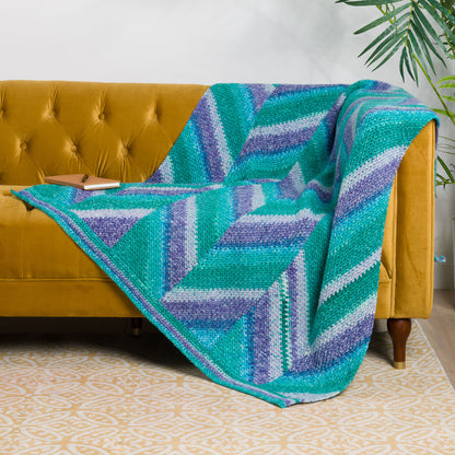 Red Heart Change of Stripes Crochet Panel Blanket Change Of Stripes Crochet Panel Blanket made using Red Heart yarn