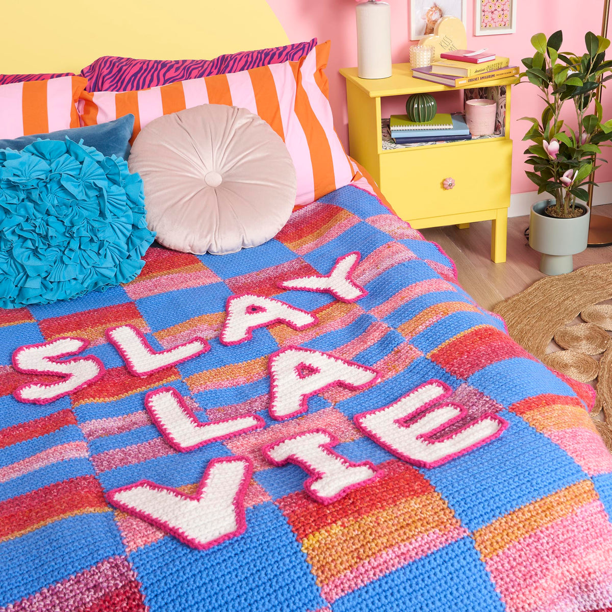 Crochet Check My Text Blanket made using Red Heart yarn
