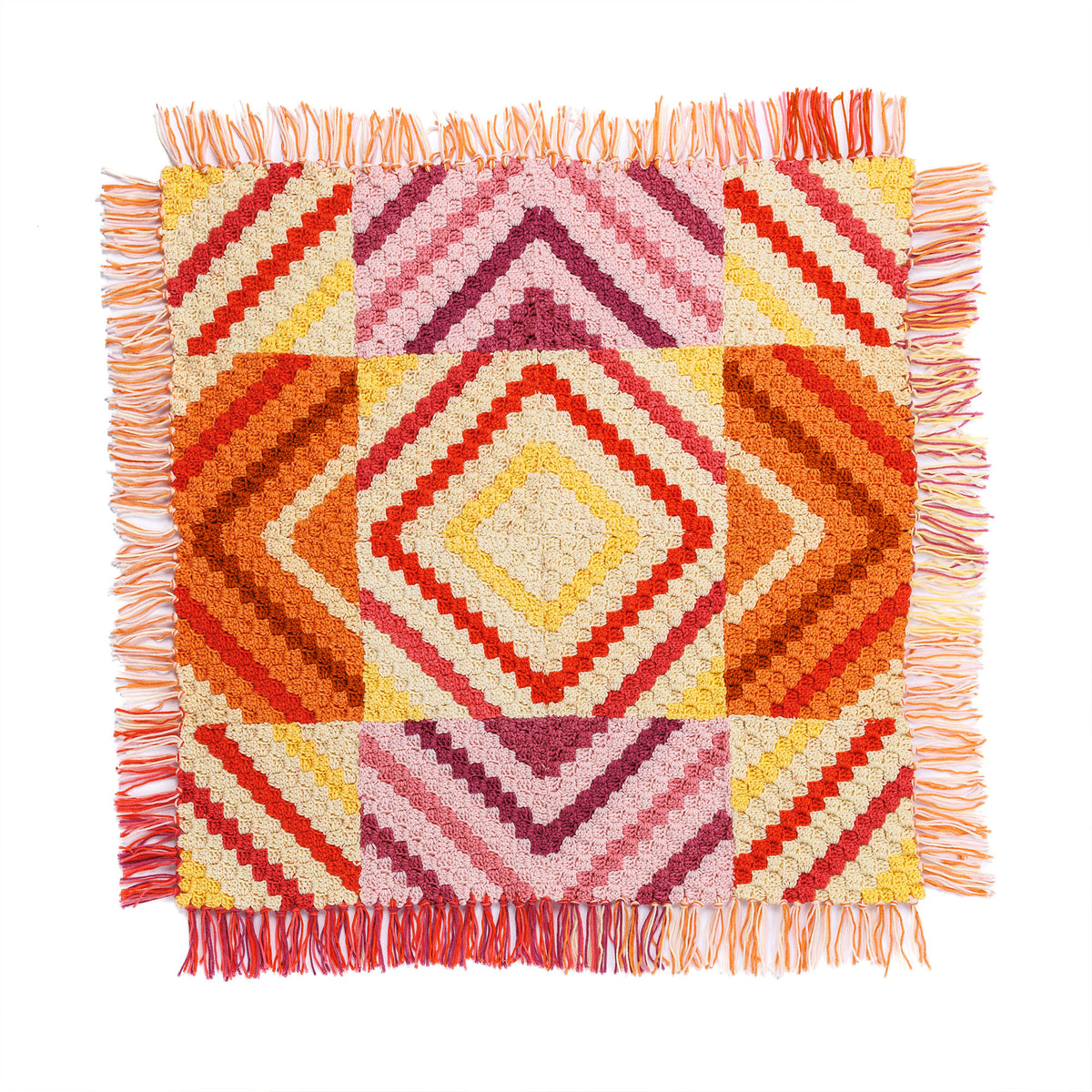 Crochet Whirlwind Fringe Quilt made using Red Heart yarn