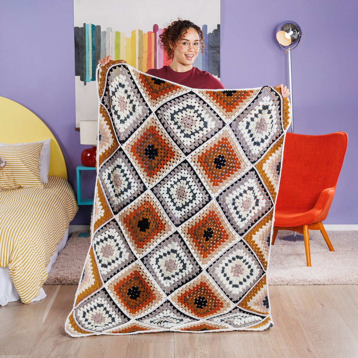 Tilted Treasures Crochet Blanket made using Red Heart yarn
