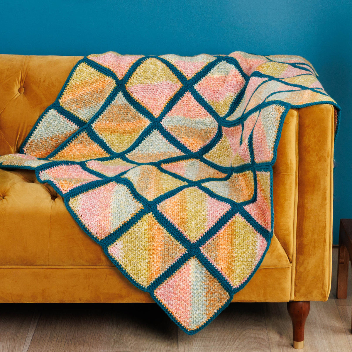 Crochet Mossy Blocks Blanket made using Red Heart yarn