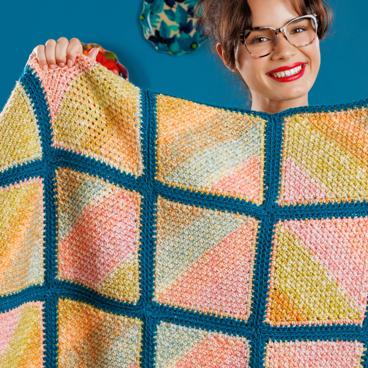 Crochet Mossy Blocks Blanket made using Red Heart yarn