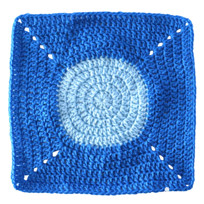 Red Heart Under the Sea Crochet Blanket Under The Sea Crochet Blanket made using Red Heart yarn in a styled lifestyle setting