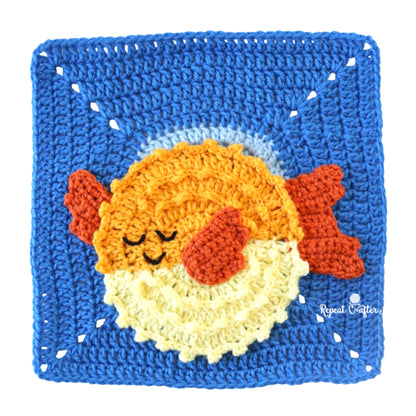 Red Heart Under the Sea Crochet Blanket Under The Sea Crochet Blanket made using Red Heart yarn in a styled lifestyle setting