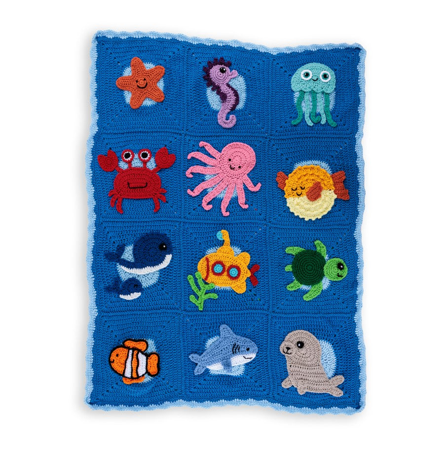 Under The Sea Crochet Blanket made using Red Heart yarn on a white background