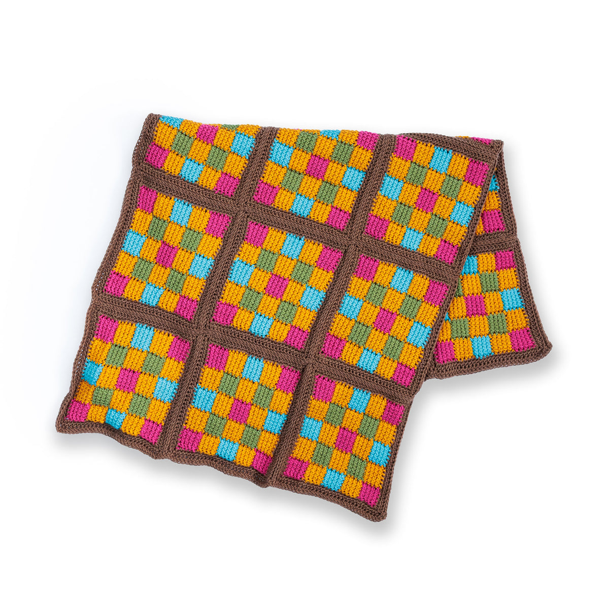 Asap Blankie made using Red Heart yarn in a styled lifestyle setting