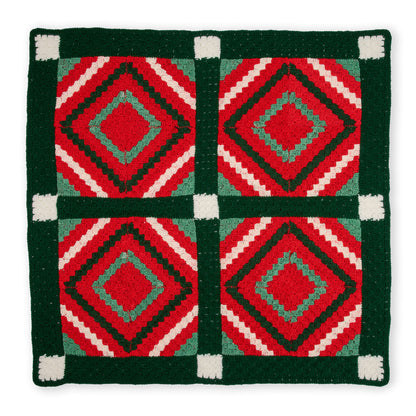 Red Heart Crochet Quilted Classic Christmas Blanket Crochet Quilted Classic Christmas Blanket made using Red Heart yarn on a white background