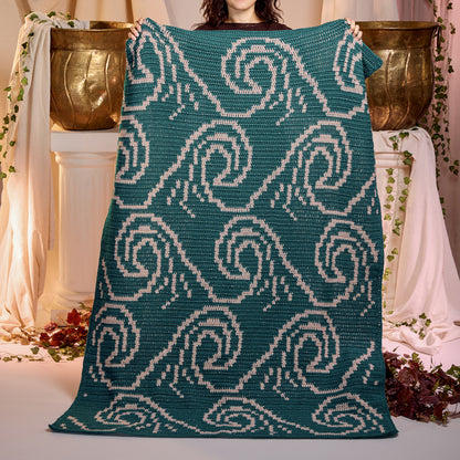 Red Heart It's Just a Wave Crochet Blanket It'S Just A Wave Crochet Blanket made using Red Heart yarn in a styled lifestyle setting