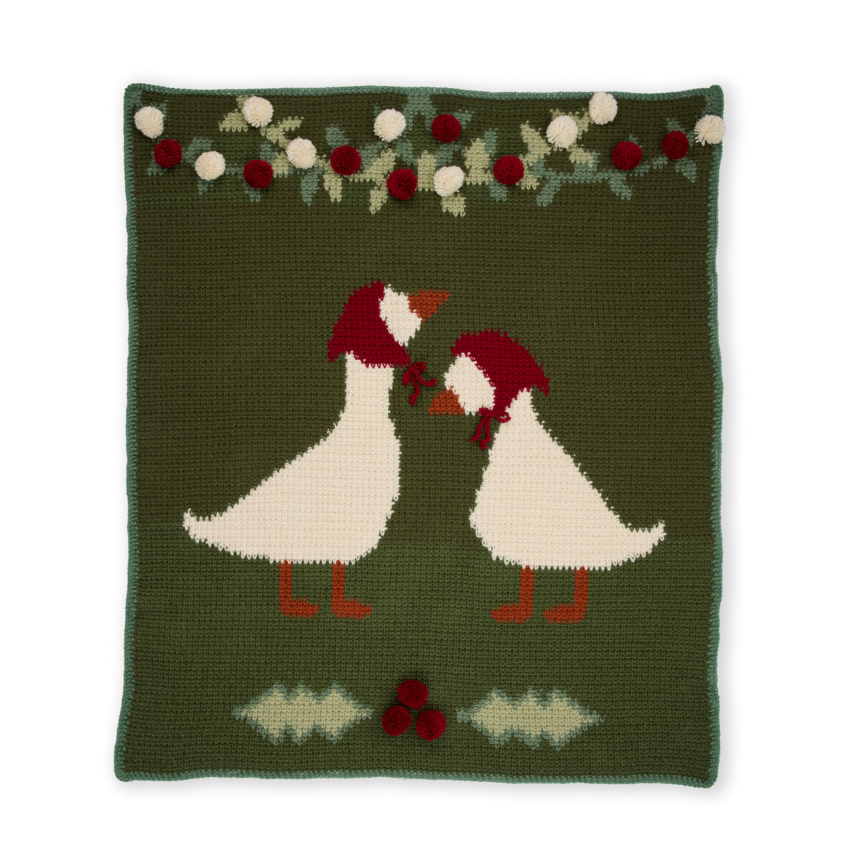 Holiday Geese Crochet Blanket made using Red Heart yarn on a white background