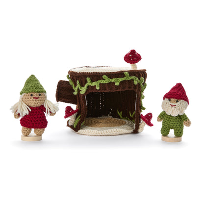 Red Heart Crochet Gnomes with a Little Stump House Crochet Gnomes With A Little Stump House made using Red Heart yarn in a styled lifestyle setting