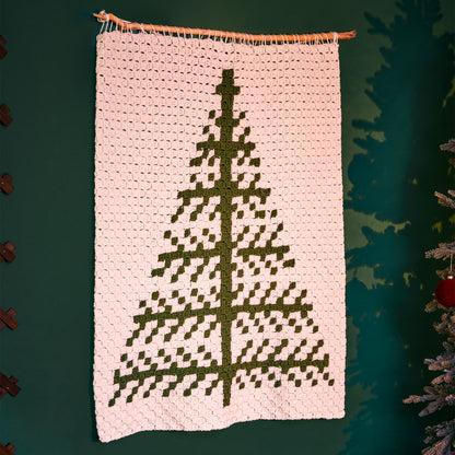 Red Heart Graphic Tree Crochet Wall Hanging Graphic Tree Crochet Wall Hanging made using Red Heart yarn in a styled lifestyle setting