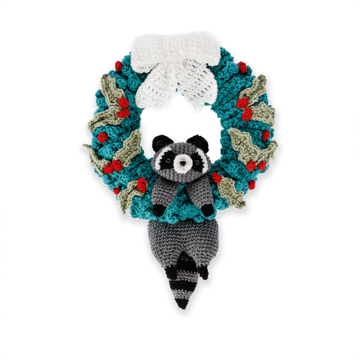 Crocheted raccoon with a crocheted wreath using Red Heart yarns.