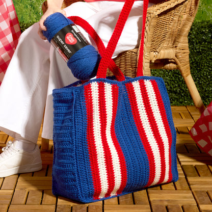 Red Heart Beachside Stripes Crochet Bag Beachside Stripes Crochet Bag made using Red Heart yarn in a styled lifestyle setting