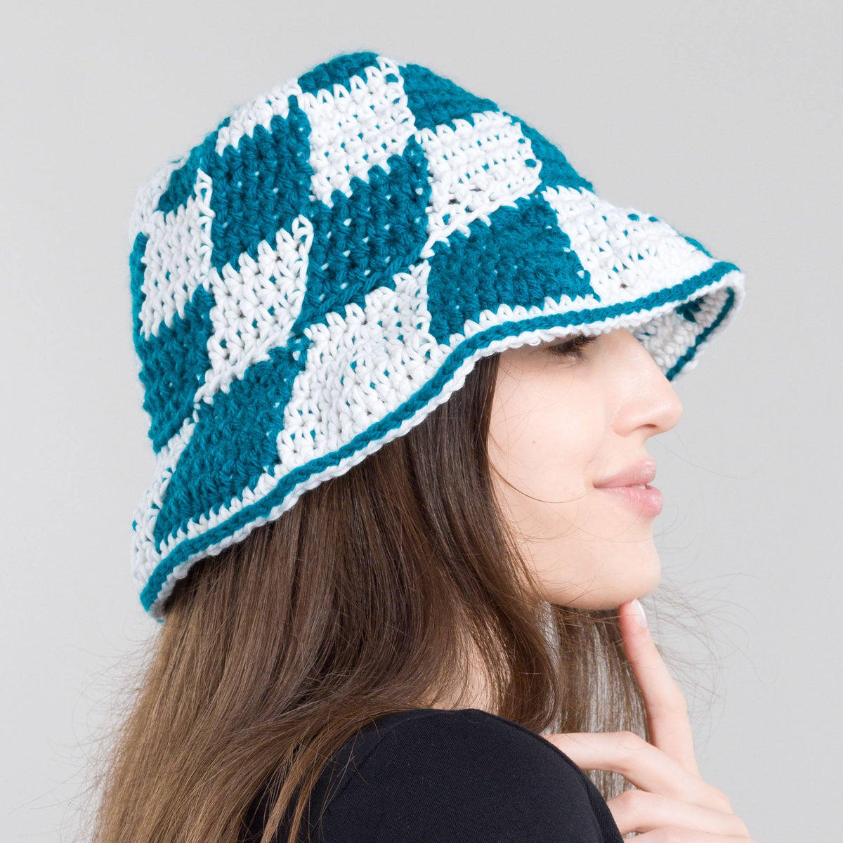 Crochet Glow-Y Checkerboard Hat made using Red Heart yarn