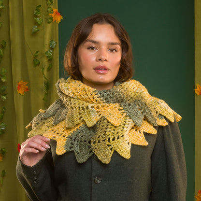 Red Heart Dragon’s Hoard Crochet Shawl Dragon’S Hoard Crochet Shawl made using Red Heart yarn in a styled lifestyle setting