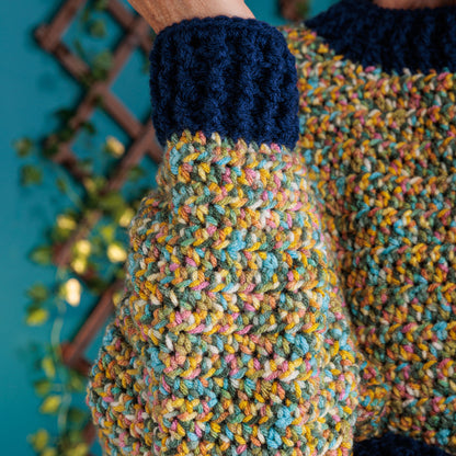 Red Heart Getting Cozy Crochet Pullover Getting Cozy Crochet Pullover made using Red Heart yarn in a styled lifestyle setting