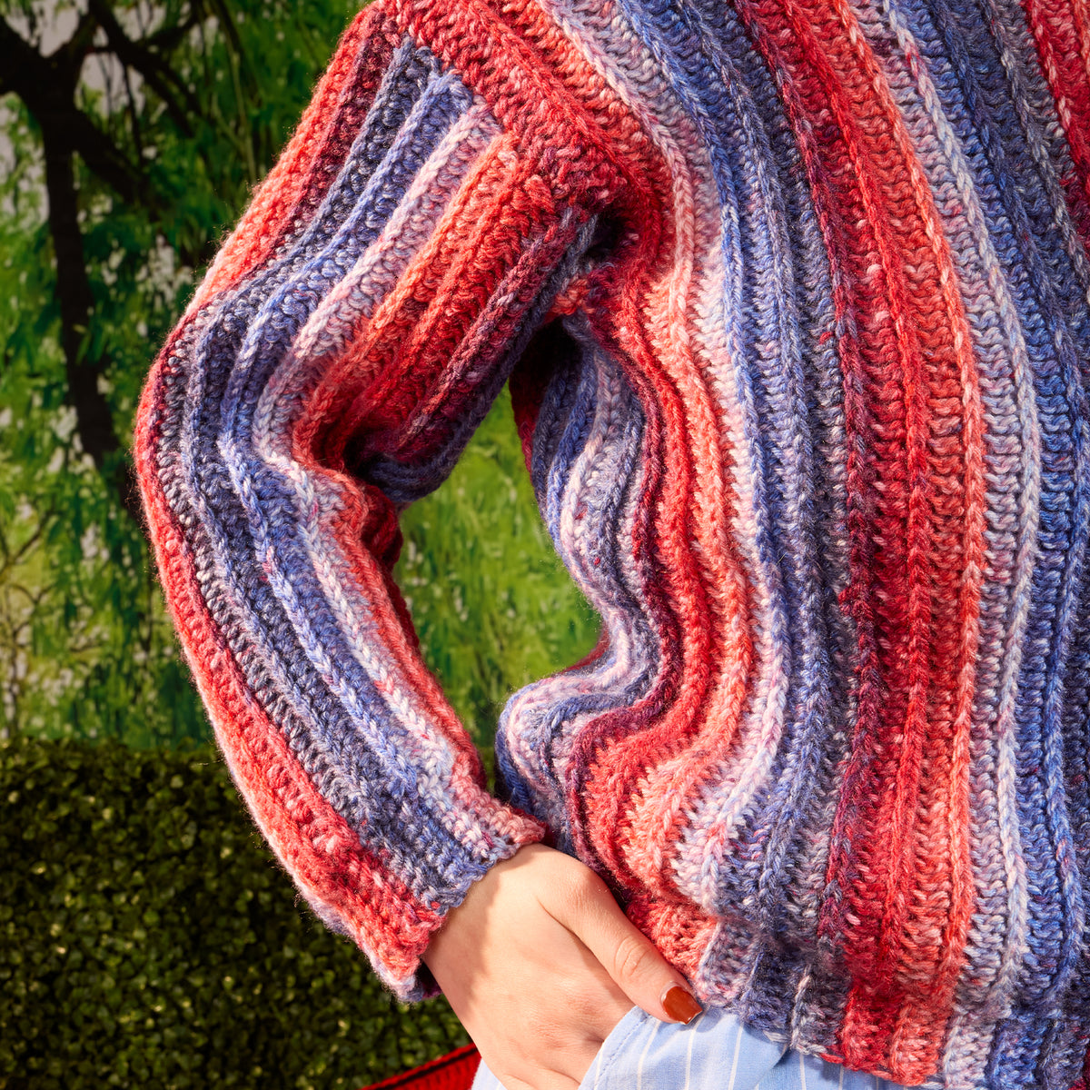 Sizzling Stripes Crochet Pullover made using Red Heart yarn