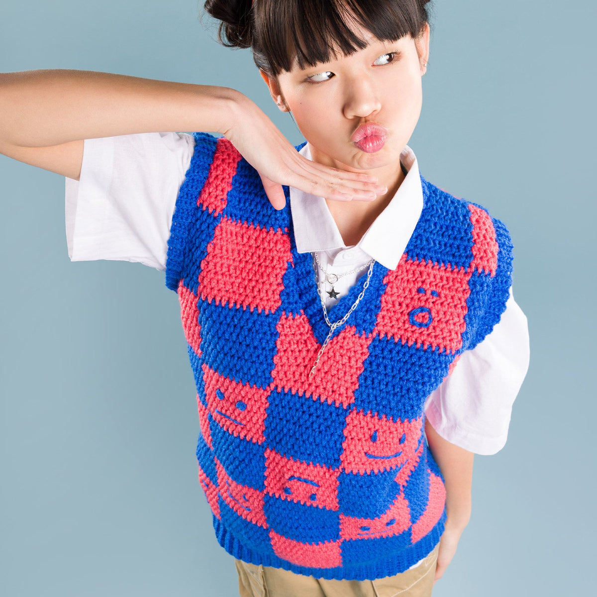Crochet Checkerboard Mood Sweater Vest made using Red Heart yarn